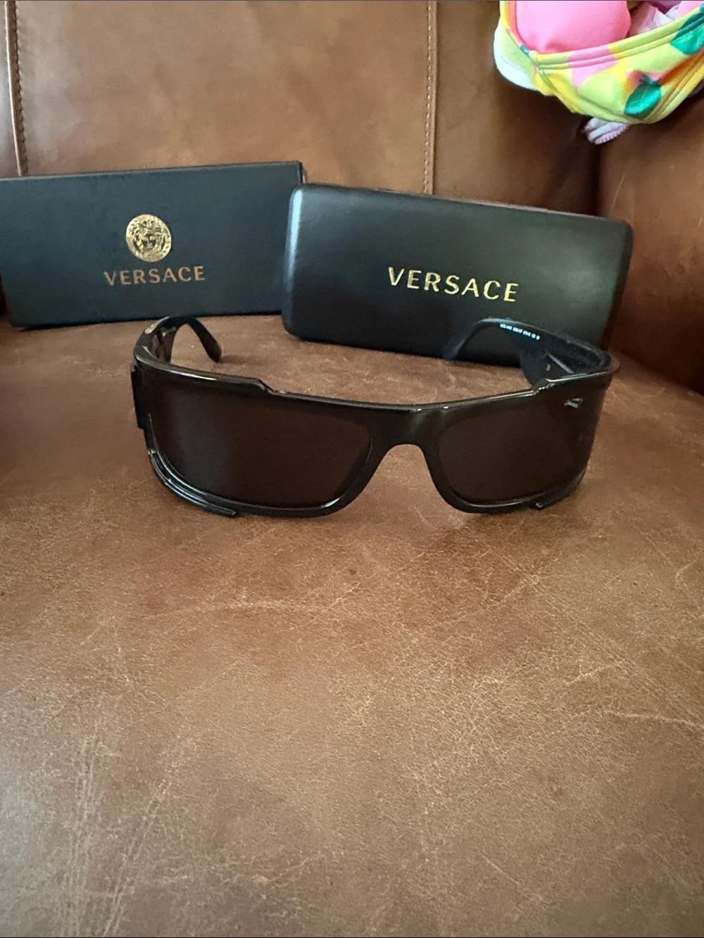 Versace Black Sunglasses with Gold Medallion Accent